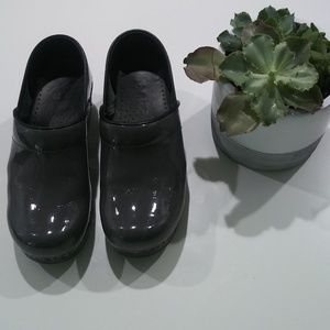 Sanita patent leather clogs